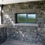 Split Basalt With Rock Faced Cill And Lintel