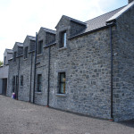 Tumbled Basalt With Rock Faced Limestone Cills And Lintels